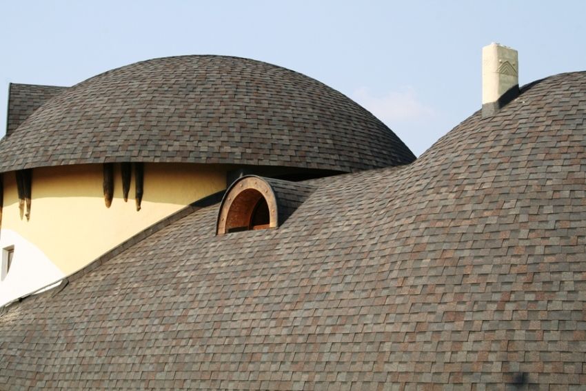 Flexible shingles can easily cover complex rounded roof shapes