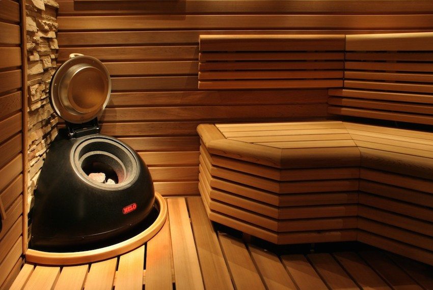 Steam room interior with a pleasant combination of wood, stone and steel