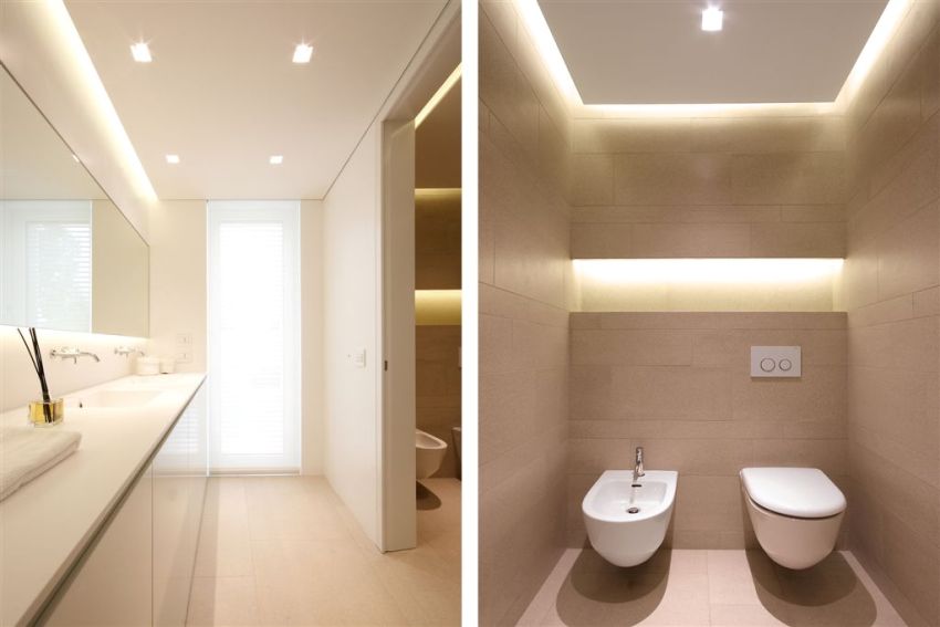 Bathroom with a suspended ceiling in the style of minimalism