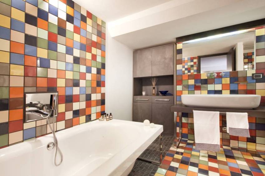 Multi-colored tiles are often used for bathroom design