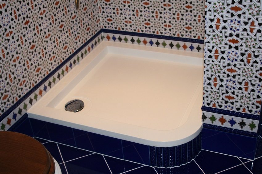 Acrylic shower tray tiled with ceramic tiles