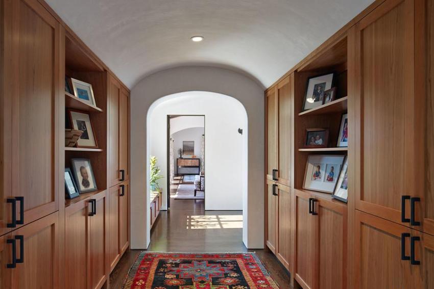 Spacious wooden cabinets in the hallway