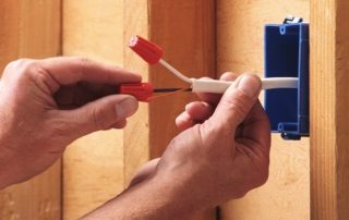 Do-it-yourself electrical wiring in a wooden house. Step-by-step method of performing work