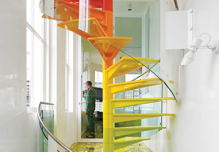 Modern spiral staircase made of metal and glass