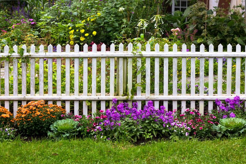 The flower garden will simply and tastefully combine with any fence
