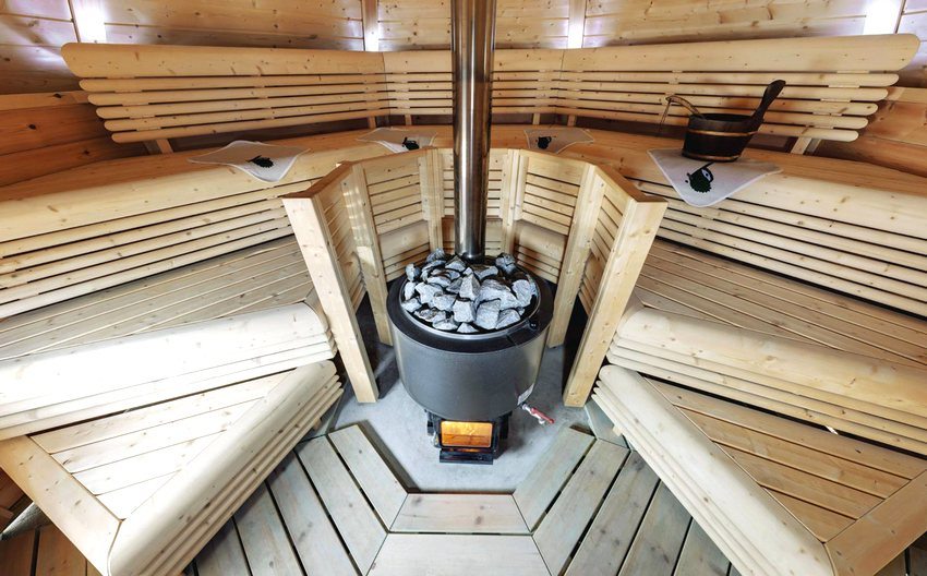 Wood-burning sauna stove with water tank