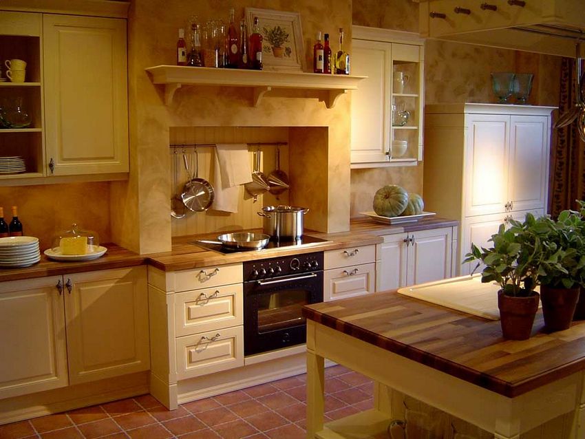 For a small kitchen, it is better to use tiles of medium or small size.