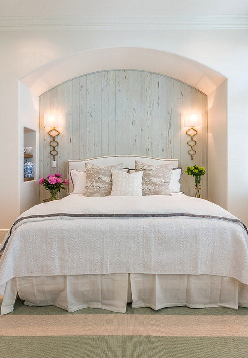 Bedroom in the style of Provence, in the design of which a plain wallpaper of a light shade is combined with a wood imitation