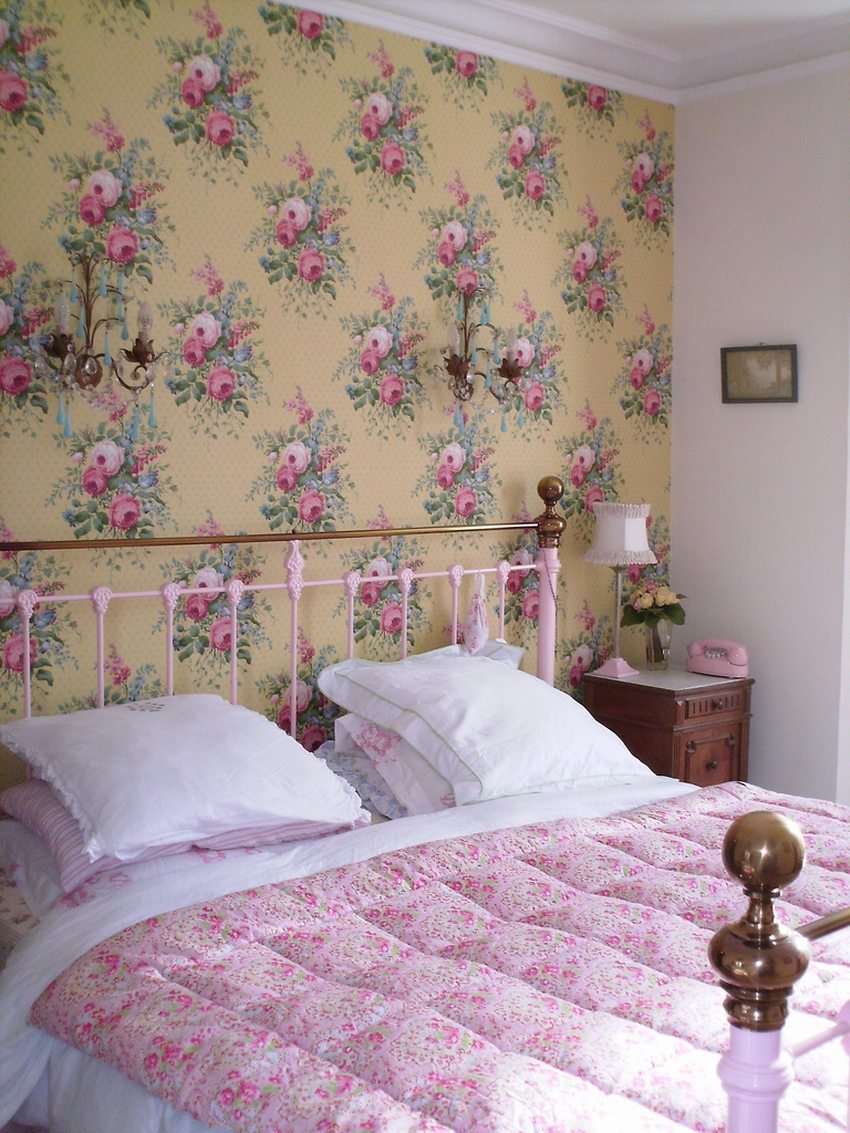 The bedroom interior is made in a romantic style