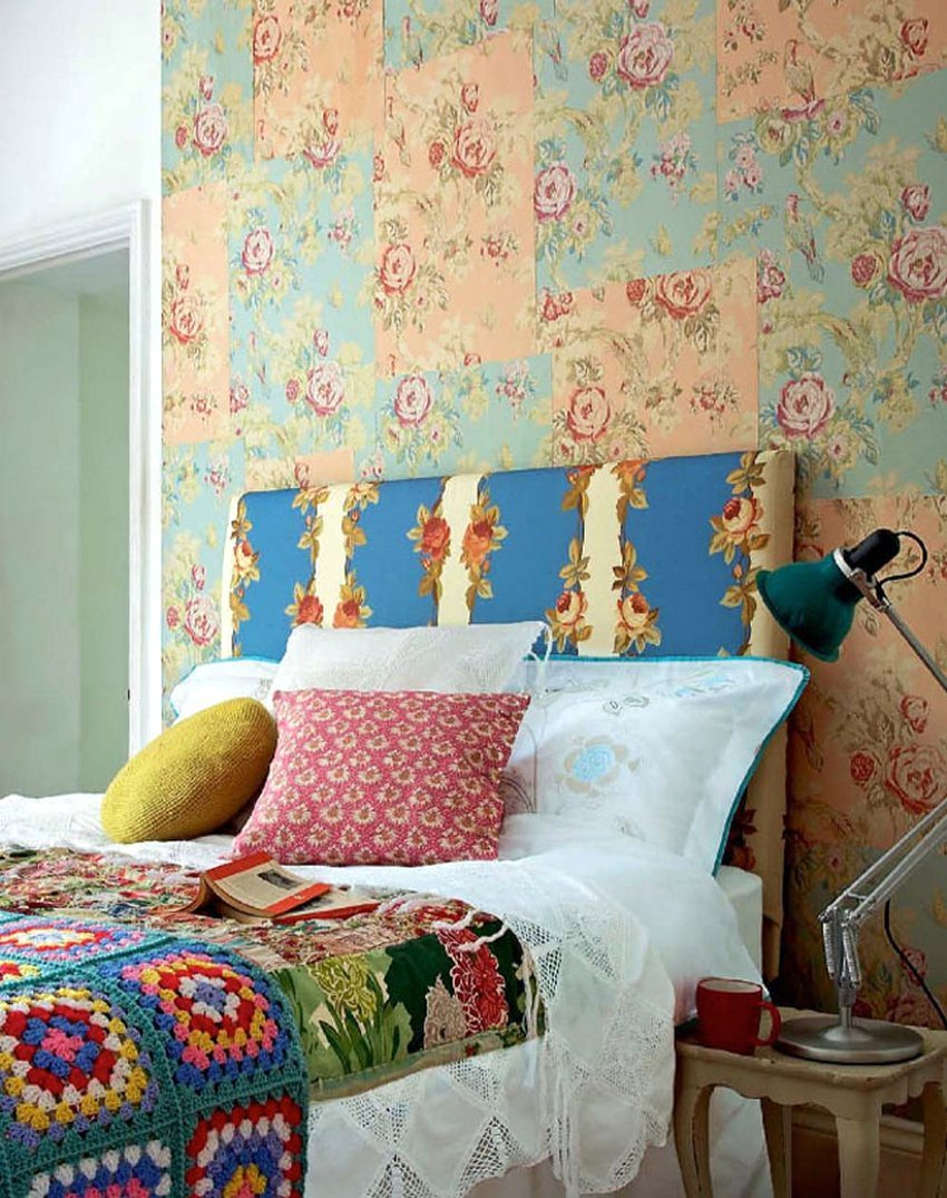 The interior of the bedroom in a rustic style is made using two types of wallpaper