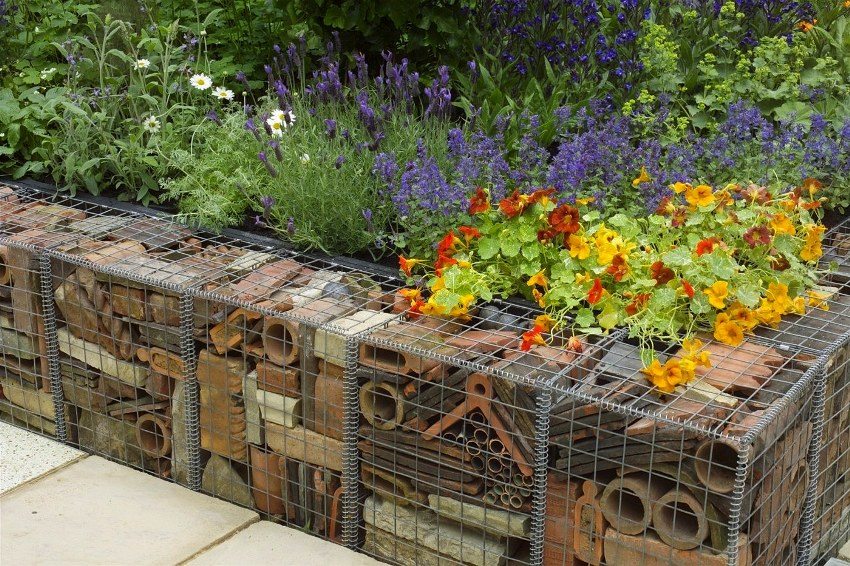 To fill the gabion, you can use the remains of building materials