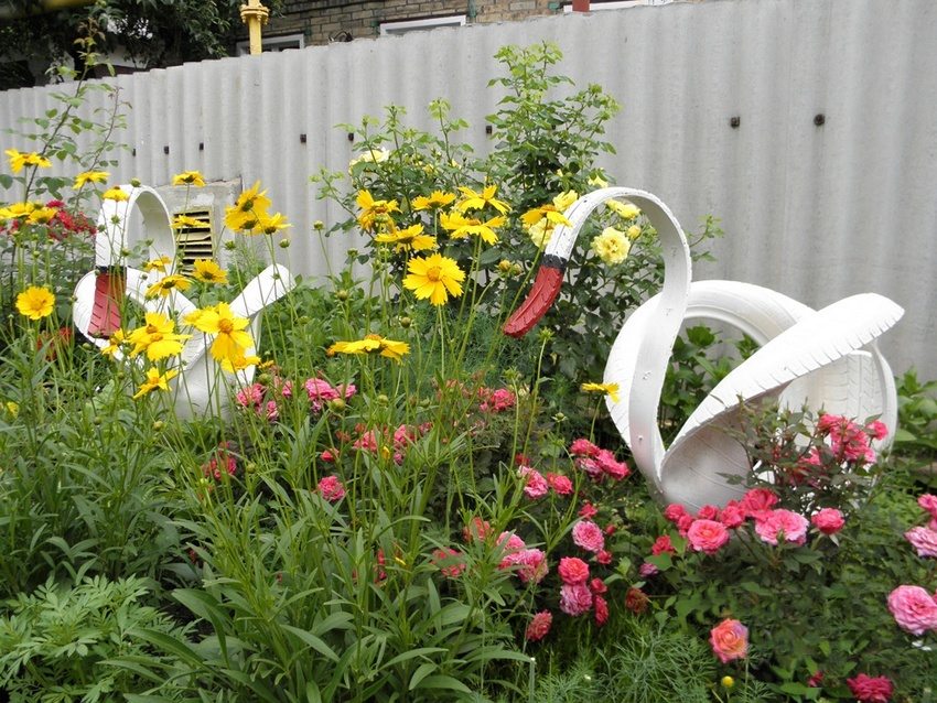 Swan flower beds made from car tires