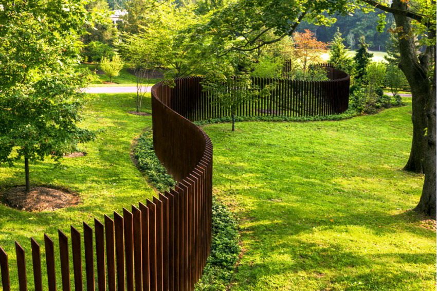 A fence made of wood or any other material can have various design options