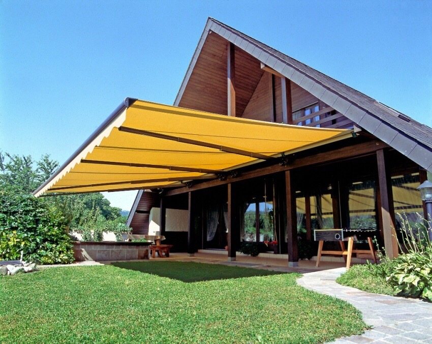 A fold-out awning that shades a large area - an indispensable accessory for a terrace