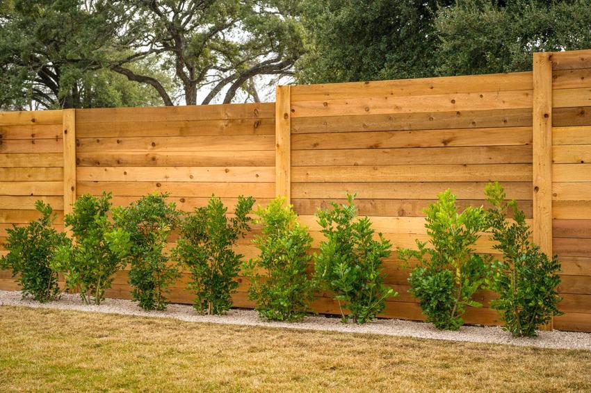 Solid fencing with horizontal planks