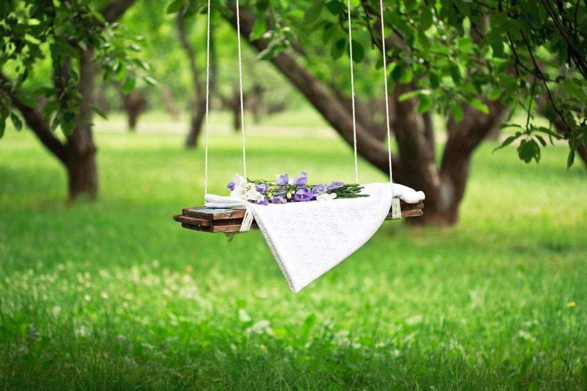 Beautiful hanging swing in the garden of a private house