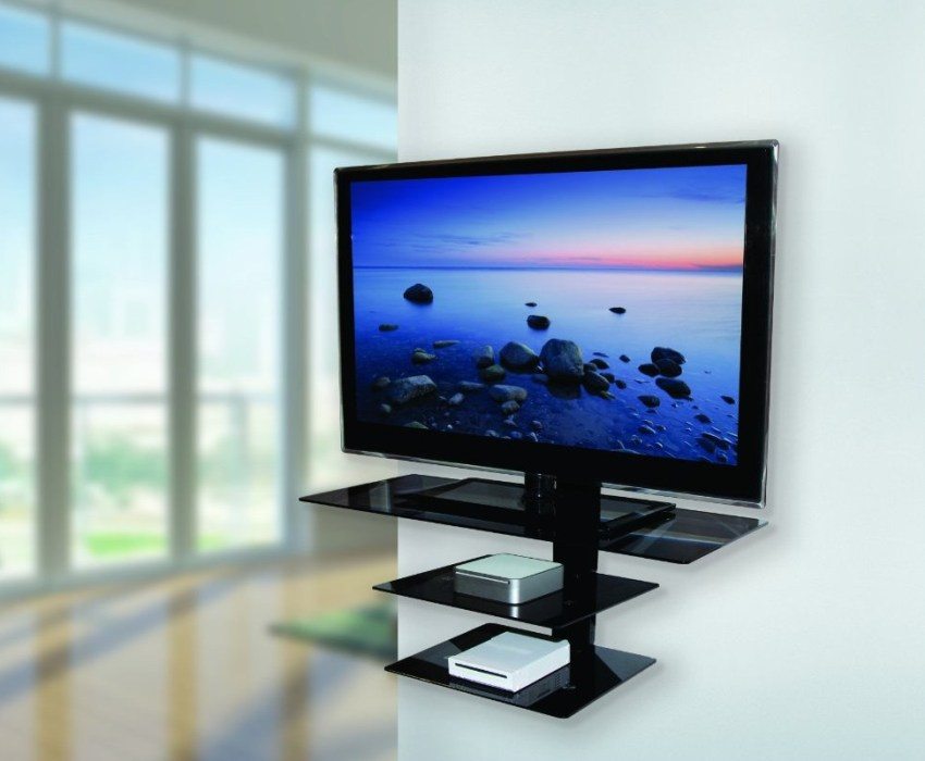 A bracket with shelves will allow you to place a remote control, disks and other items near the TV