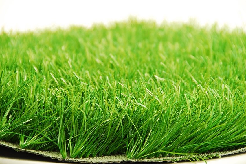 Synthetic turf is a practical cover option for a playground