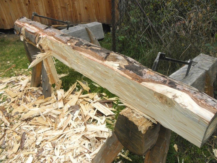 The process of making a garden bench from a log