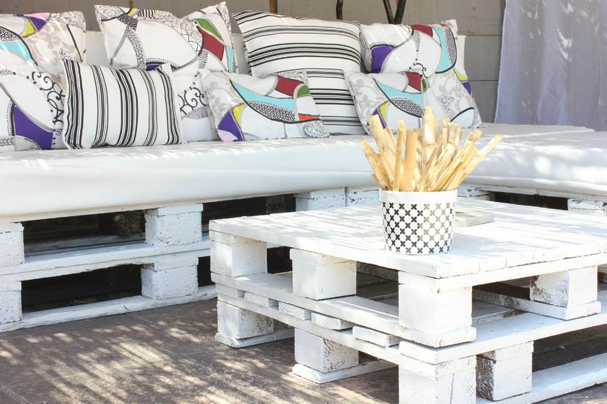 White painted Euro pallet bench with soft seat and cushions