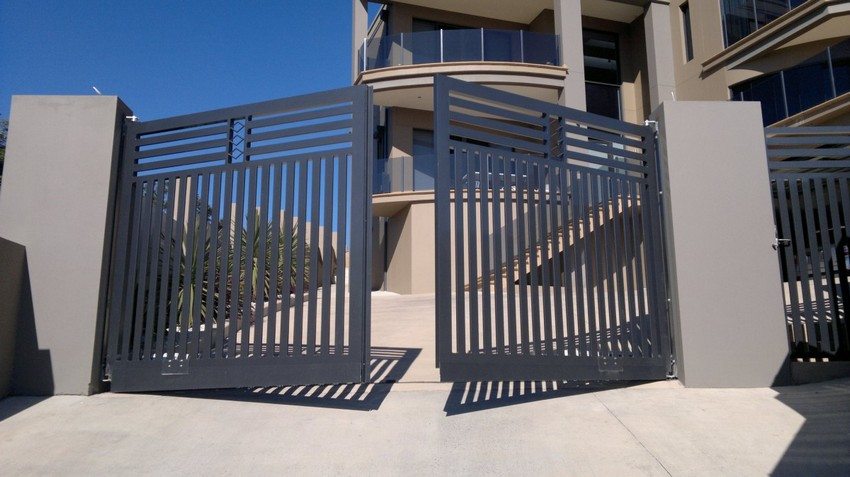 Modern design of metal swing gates with a wicket