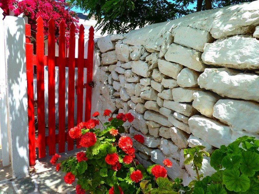 Beautiful fence made of white natural stone