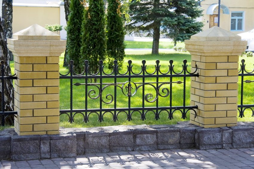 The cost of a forged fence can be reduced by using other materials