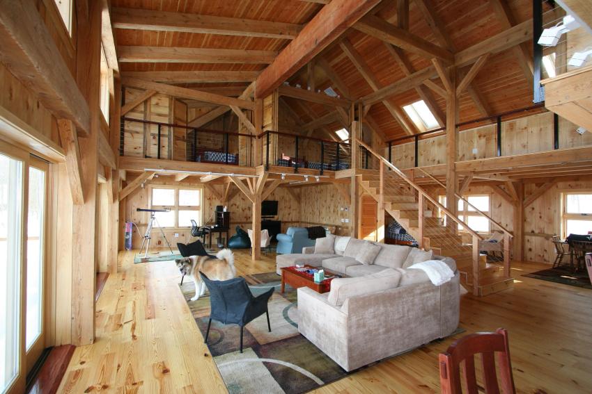 Multifunctional zoned space of a two-story wooden house
