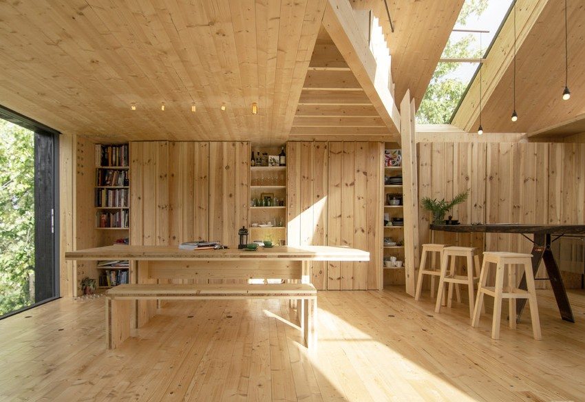 Light shades prevail in the interior of a house made of laminated veneer lumber