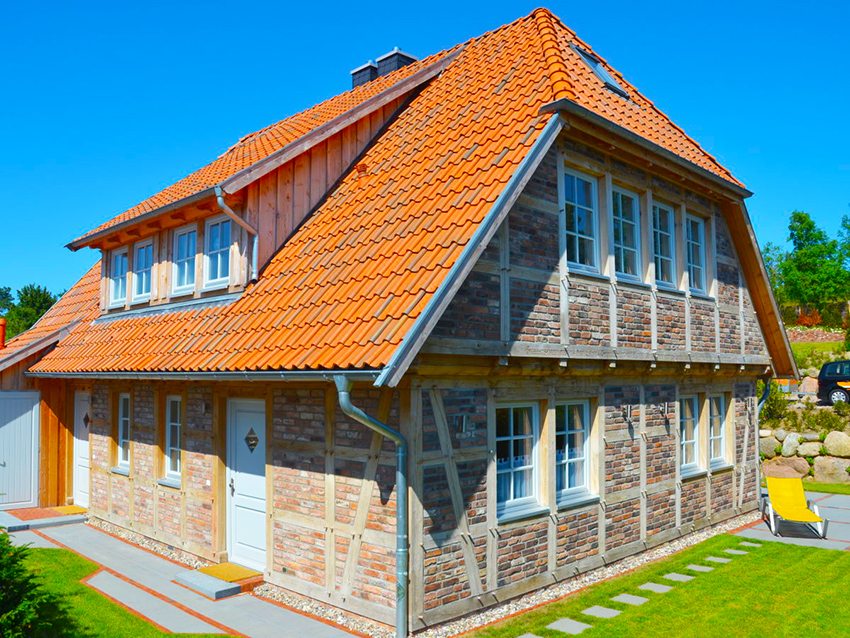 For a half-hipped roof with an attic, a metal roof is used
