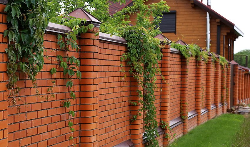 If the fence is made of brick or stone, then it will be advisable to install parapets on it