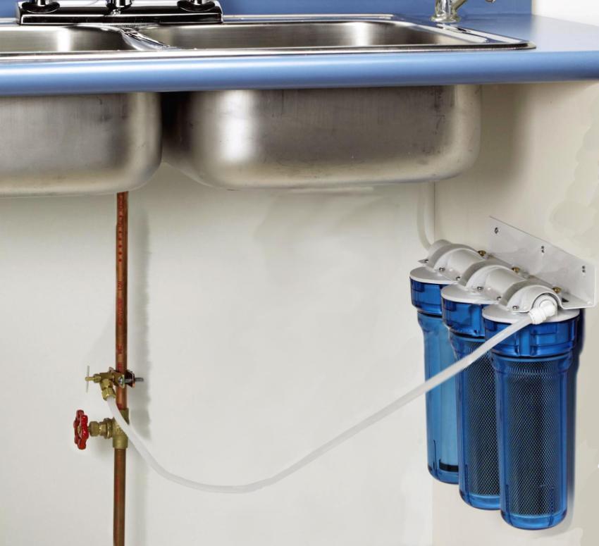 Three-stage flow-through water purification system