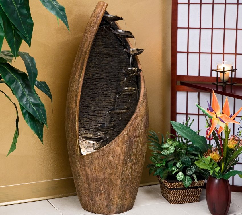 A decorative waterfall or living plants is one of the best ways to naturally humidify indoor air.