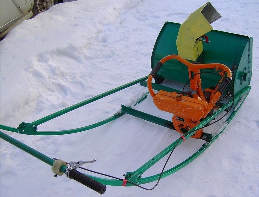 DIY snowplow with chainsaw engine