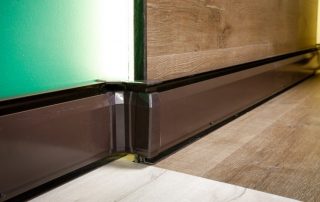 Electric warm skirting board: installation and operation features