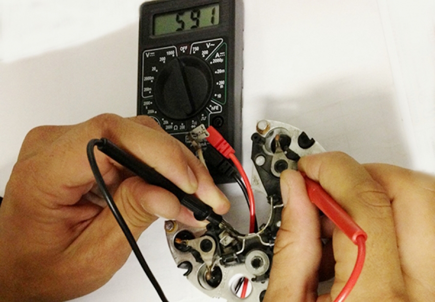 The use of a multimeter when checking the performance or damage of a diode bridge