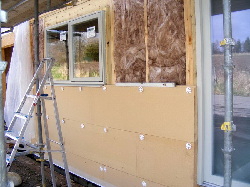 Insulation of a wooden house is better done outside than inside
