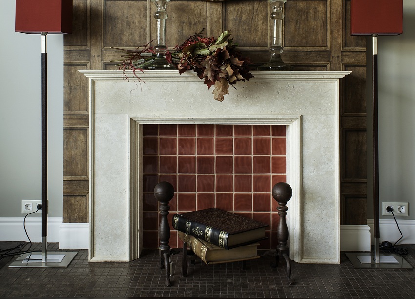 It is easy to create a decorative fireplace from plaster in a discreet, austere style.