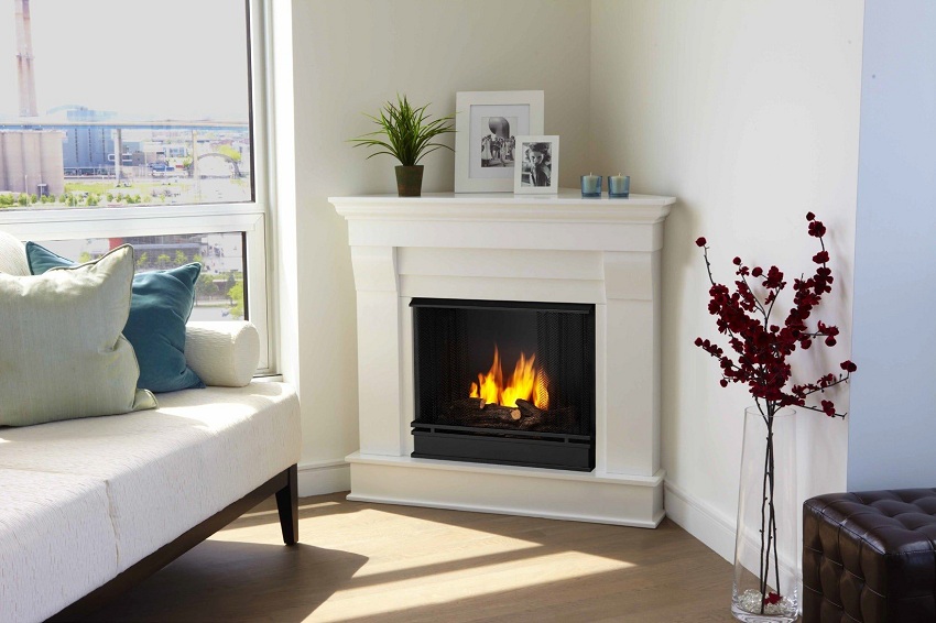 A fireplace installed in the corner opposite the front door will be a bright accent in the interior.