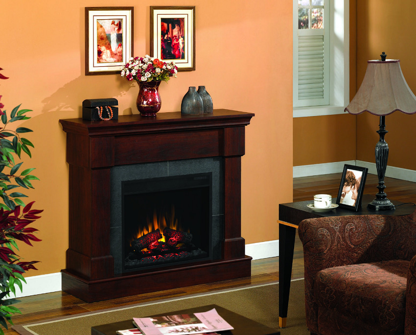 Decorative fireplace with electric lighting in the firebox