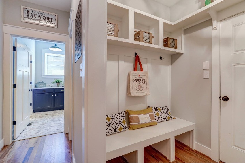 Instead of purchasing cabinets in a niche of a small-sized corridor, the structure can be equipped with shelves for personal accessories and shoes