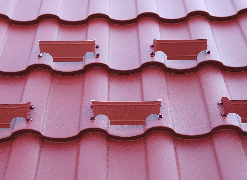 Slatted snow guards are used on roofs with a slight slope