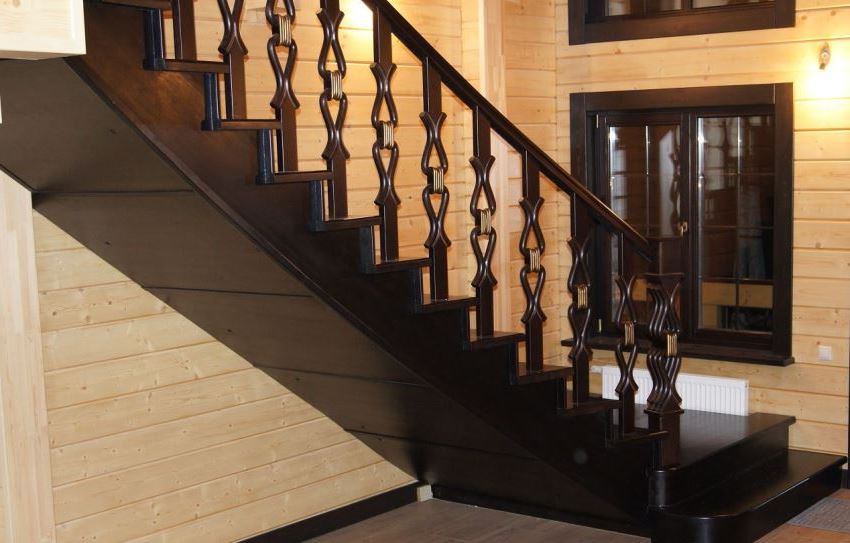 Carved flat balusters bring a sense of lightness and airiness to the interior