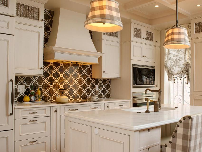 Designers do not recommend finishing all the walls in the kitchen with tiles, as it will look heavy