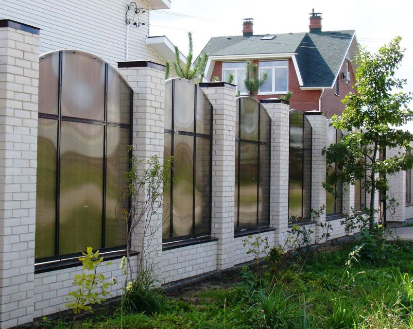 Polycarbonate sheets transmit up to 90% of sunlight, while the crystal structure refracts it in such a way that the fence allows you to hide behind it from prying eyes