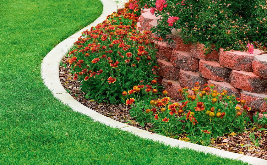 The creation of a flower bed from stone blocks will make it possible to make a durable and beautiful structure