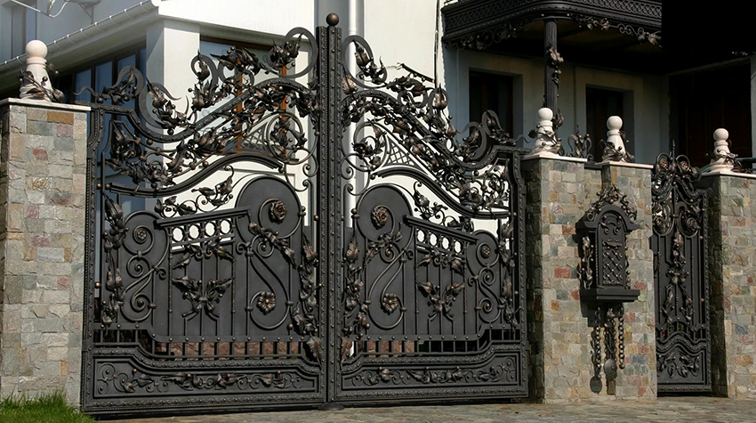 Wrought iron gates in the Gothic style look stylish and unusual