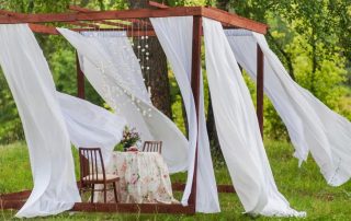 Outdoor curtains for gazebos and verandas: beautiful protection from insects and the sun