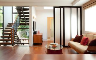 Glass interior door as a stylish accent in a modern interior