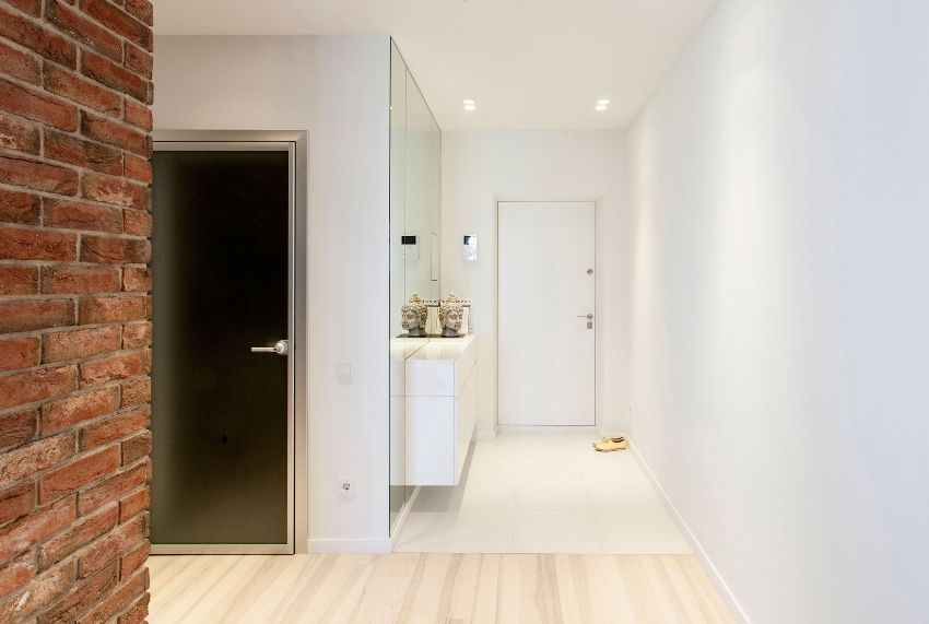 In a small hallway, it would be appropriate to place LED lighting or small spotlights